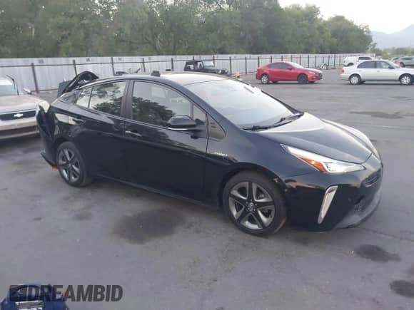 2022 Toyota Prius LE with VIN JTDKAMFU9N3159872, listed as a IAAI auction lot 42850013 with 49,455 mi miles and . Bid and sale history available at DreamBid. Image 1.