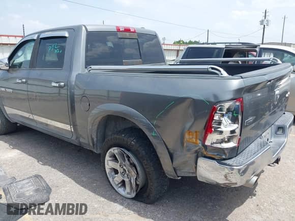 2012 Ram 1500 Laramie with VIN 1C6RD7NT3CS109608, listed as a IAAI auction lot 42639790 with 188,094 mi miles and . Bid and sale history available at DreamBid. Image 3.