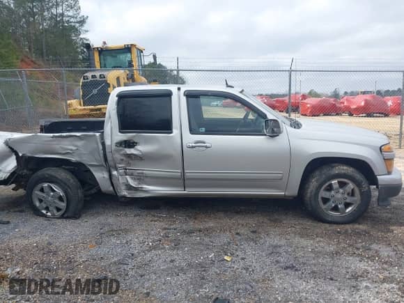 2010 Chevrolet Colorado 1LT z VIN 1GCDSCDE7A8143405, wystawiony jako IAAI lot #41578223 z przebiegiem 158 886 mil mil oraz . Historia ofert i sprzedaży dostępna na DreamBid. Obrazek 13.