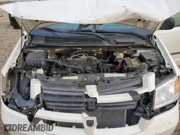 2009 Dodge Grand Caravan with VIN 2D8HN11E79R682979, listed as a Copart auction lot 71230285 with 49,442 mi miles and Salvage title. Bid and sale history available at DreamBid. Image 12.