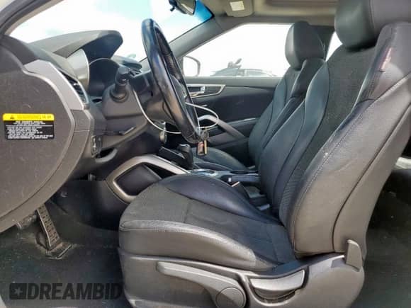 2014 Hyundai Veloster с VIN KMHTC6ADXEU211016, выставлен на аукционе Copart как лот 65572325 с пробегом 144 191 миль миль и Списание • Salvage title. История ставок и продаж доступна на DreamBid. Изображение 7.