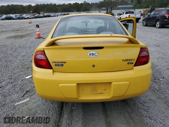 2004 Dodge Neon SXT with VIN 1B3ES56C84D538802, listed as a Copart auction lot 82187635 with 159,319 mi miles and Salvage title. Bid and sale history available at DreamBid. Image 6.
