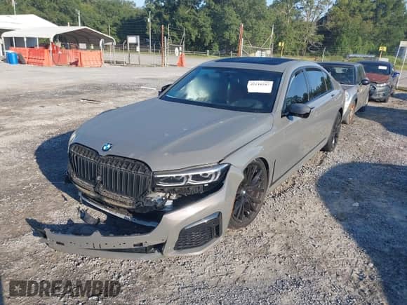 2021 BMW 7 Series 740i z VIN WBA7T2C01MCF23447, wystawiony jako IAAI lot #43110287 z przebiegiem Nie podano mil oraz . Historia ofert i sprzedaży dostępna na DreamBid. Obrazek 17.