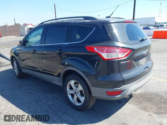 2014 Ford Escape SE with VIN 1FMCU0GX8EUE40872, listed as a IAAI auction lot 43359211 with 146,863 mi miles and . Bid and sale history available at DreamBid. Image 3.