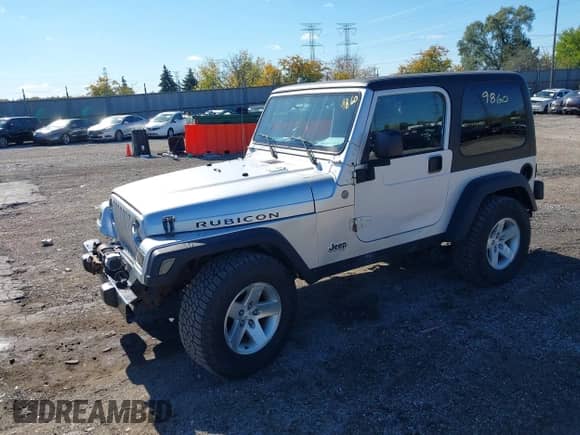 2004 Jeep Wrangler Rubicon with VIN 1J4FA69S34P778038, listed as a IAAI auction lot 43519860 with 145,217 mi miles and . Bid and sale history available at DreamBid. Image 17.