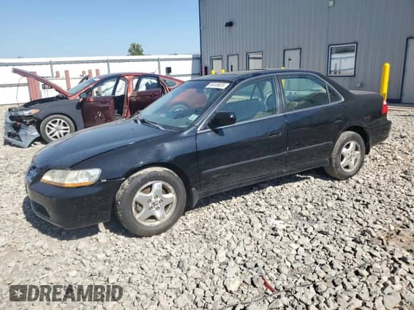 1999 Honda Accord EX with VIN 1HGCG1654XA012935, listed as a Copart auction lot 84449635 with 205,773 mi miles and Non repairable. Bid and sale history available at DreamBid. Image 1.