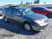 2003 Toyota Camry LE with VIN JTDBE32K530180767, listed as a IAAI auction lot 43276458 with 189,568 mi miles and . Bid and sale history available at DreamBid. Image 1.