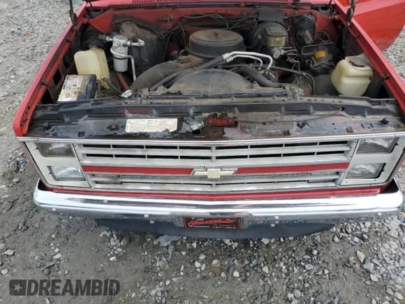 1986 Chevrolet Silverado 1500 с VIN 1GCDC14H1GF410960, выставлен на аукционе Copart как лот 68271265 с пробегом 5 940 миль миль и На запчасти • Non repairable. История ставок и продаж доступна на DreamBid. Изображение 11.