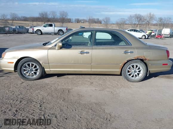 2002 Hyundai XG L z VIN KMHFU45E72A204717, wystawiony jako IAAI lot #41386637 z przebiegiem 182 310 mil mil oraz . Historia ofert i sprzedaży dostępna na DreamBid. Obrazek 14.