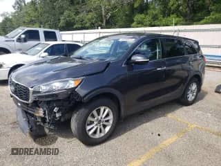 2019 Kia Sorento L z VIN 5XYPG4A37KG501751, wystawiony jako Copart lot #66150575 z przebiegiem 122 639 mil mil oraz Szkoda całkowita • Salvage title. Historia ofert i sprzedaży dostępna na DreamBid. Obrazek 1.