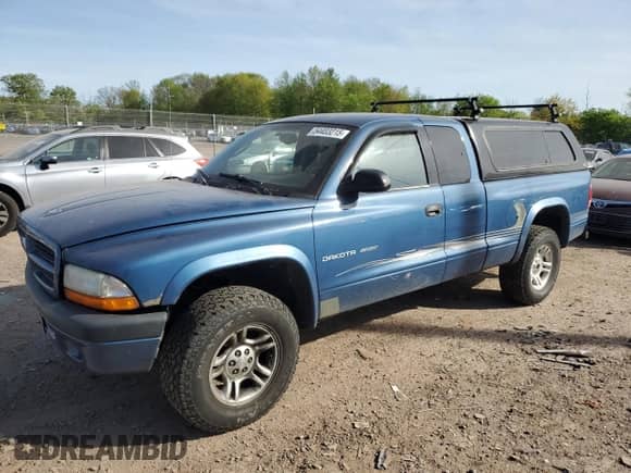 2002 Dodge Dakota Sport с VIN 1B7GG32N52S661020, выставлен на аукционе Copart как лот 54403215 с пробегом 133 284 миль миль и Списание • Salvage title. История ставок и продаж доступна на DreamBid. Изображение 1.