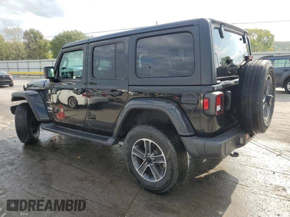 2023 Jeep Wrangler Sahara Altitude with VIN 1C4HJXEG1PW600466, listed as a Copart auction lot 80017505 with 21,912 mi miles and Salvage title. Bid and sale history available at DreamBid. Image 2.