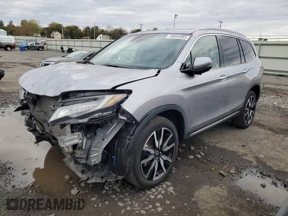 2020 Honda Pilot Touring 8-Passenger z VIN 5FNYF6H92LB010073, wystawiony jako Copart lot #89854985 z przebiegiem 28 856 mil mil oraz Szkoda całkowita • Salvage title. Historia ofert i sprzedaży dostępna na DreamBid. Obrazek 1.