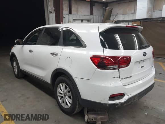 2019 Kia Sorento L with VIN 5XYPG4A34KG503490, listed as a IAAI auction lot 43218576 with 124,289 mi miles and . Bid and sale history available at DreamBid. Image 3.