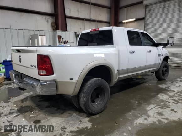 2010 Dodge 3500 Laramie with VIN 3D73Y4HL7AG193326, listed as a Copart auction lot 87431914 with 301,272 mi miles and Salvage title. Bid and sale history available at DreamBid. Image 3.