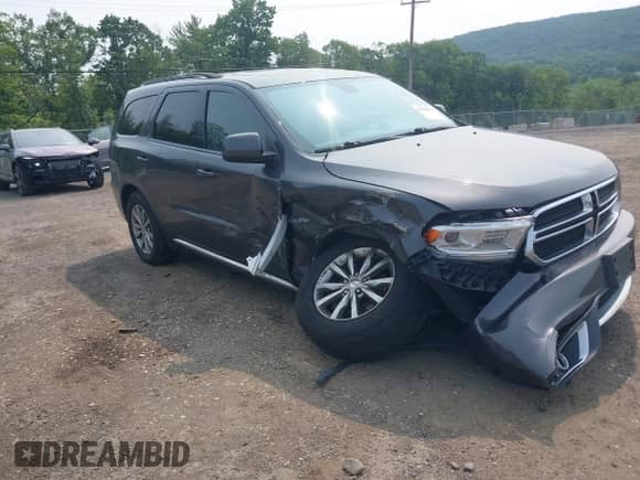 2018 Dodge Durango SXT with VIN 1C4RDJAG5JC111284, listed as a IAAI auction lot 42428976 with 105,083 mi miles and . Bid and sale history available at DreamBid. Image 6.