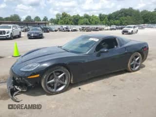 2011 Chevrolet Corvette 1LT with VIN 1G1YE2DW9B5109831, listed as a Copart auction lot 58710295 with 77,708 mi miles and Salvage title. Bid and sale history available at DreamBid. Image 1.