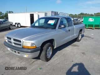 2001 Dodge Dakota with VIN 1B7GL22X21S121968, listed as a IAAI auction lot 43317250 with 163,485 mi miles and . Bid and sale history available at DreamBid. Image 2.
