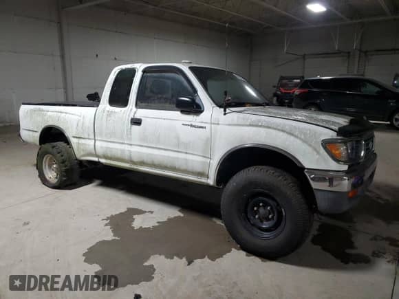 1997 Toyota Tacoma z VIN 4TAWN72N0VZ221965, wystawiony jako Copart lot #54206905 z przebiegiem 105 137 mil mil oraz Szkoda całkowita • Salvage title. Historia ofert i sprzedaży dostępna na DreamBid. Obrazek 4.