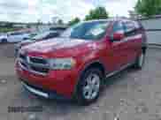 2011 Dodge Durango Crew with VIN 1D4RD4GG8BC634392, listed as a IAAI auction lot 42552266 with 166,166 mi miles and . Bid and sale history available at DreamBid. Image 2.