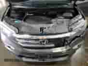 2017 Honda Pilot EX-L z VIN 5FNYF6H70HB027184, wystawiony jako Copart lot #85877605 z przebiegiem 180 606 mil mil oraz Szkoda całkowita • Salvage title. Historia ofert i sprzedaży dostępna na DreamBid. Obrazek 12.