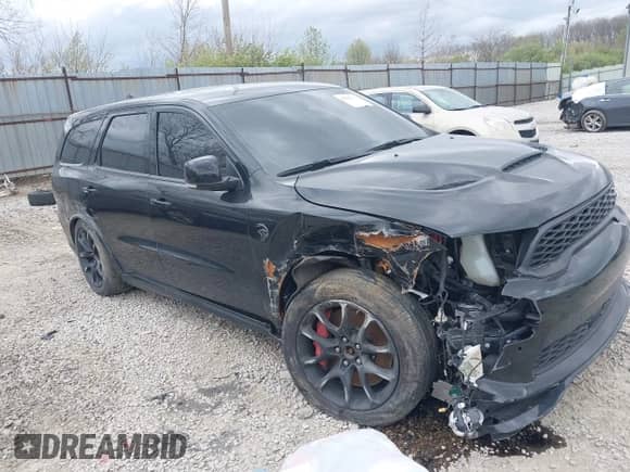 2021 Dodge Durango SRT Hellcat with VIN 1C4SDJH91MC682235, listed as a IAAI auction lot 42029380 with 9,921 mi miles and . Bid and sale history available at DreamBid. Image 13.