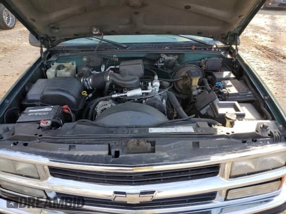 1996 Chevrolet Suburban with VIN 3GNEC16R7TG133368, listed as a Copart auction lot 49671545 with 192,875 mi miles and Salvage title. Bid and sale history available at DreamBid. Image 13.