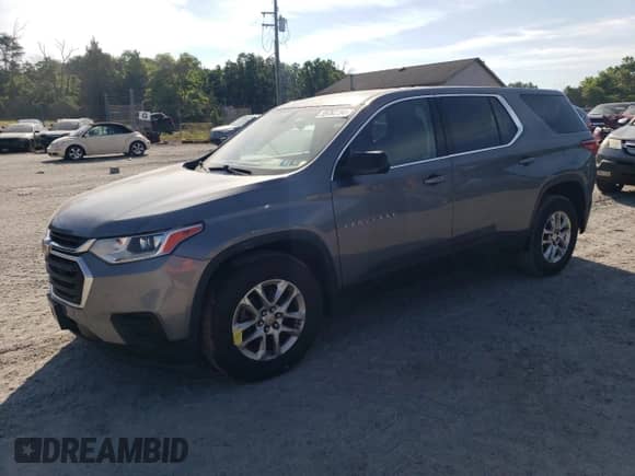 2018 Chevrolet Traverse LS with VIN 1GNEVLKW5JJ151672, listed as a Copart auction lot 59763164 with 102,859 mi miles and Salvage title. Bid and sale history available at DreamBid. Image 1.