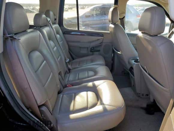 2004 Ford Explorer with VIN 1FMZU65KX4UC05800, listed as a Copart auction lot 58423175 with 129,344 mi miles and Salvage title. Bid and sale history available at DreamBid. Image 11.