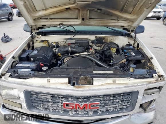 1998 GMC Sierra 1500 z VIN 1GTEC14W8WZ534837, wystawiony jako Copart lot #50653165 z przebiegiem 218 103 mil mil oraz Szkoda całkowita • Salvage title. Historia ofert i sprzedaży dostępna na DreamBid. Obrazek 11.