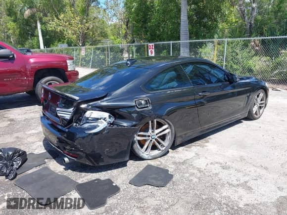 2018 BMW 4 Series 440i z VIN WBA4W7C57JAB87989, wystawiony jako IAAI lot #42259964 z przebiegiem 72 434 mil mil oraz . Historia ofert i sprzedaży dostępna na DreamBid. Obrazek 4.