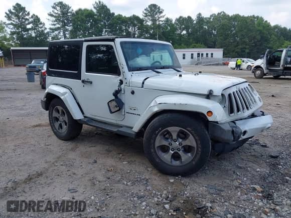 2016 Jeep Wrangler Sahara with VIN 1C4AJWBG8GL111158, listed as a IAAI auction lot 42602359 with Not provided miles and . Bid and sale history available at DreamBid. Image 1.
