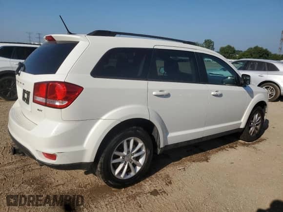2017 Dodge Journey SXT with VIN 3C4PDDBG2HT575476, listed as a Copart auction lot 68431035 with 94,526 mi miles and Salvage title. Bid and sale history available at DreamBid. Image 3.