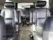 2009 Chevrolet Suburban LTZ z VIN 1GNFK36309R243475, wystawiony jako Copart lot #90379995 z przebiegiem 168 390 mil mil oraz Szkoda całkowita • Salvage title. Historia ofert i sprzedaży dostępna na DreamBid. Obrazek 10.