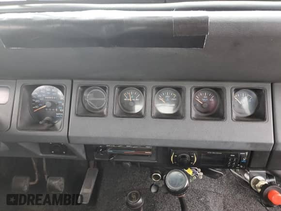 1994 Jeep Wrangler S с VIN 1J4FY19P2RP444472, выставлен на аукционе Copart как лот 80020505 с пробегом 168 245 миль миль и Списание • Salvage title. История ставок и продаж доступна на DreamBid. Изображение 9.