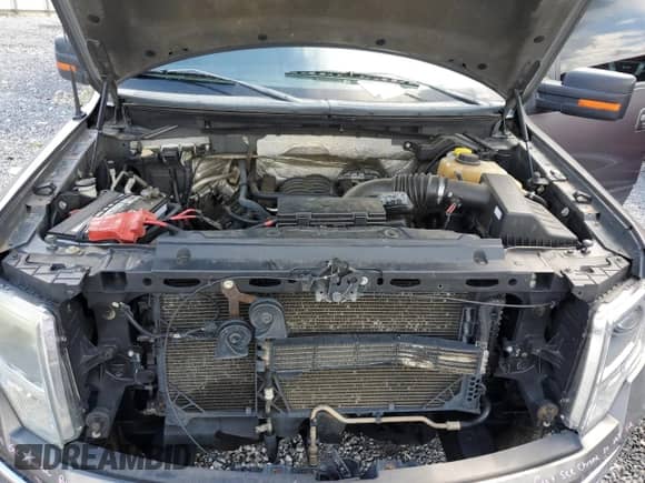 2014 Ford F-150 XL с VIN 1FTFW1EF6EKF87585, выставлен на аукционе Copart как лот 69819305 с пробегом 170 612 миль миль и Списание • Salvage title. История ставок и продаж доступна на DreamBid. Изображение 11.