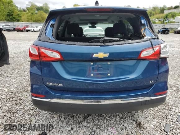 2021 Chevrolet Equinox LT z VIN 3GNAXKEV4ML392352, wystawiony jako Copart lot #81771305 z przebiegiem 59 621 mil mil oraz Szkoda całkowita • Salvage title. Historia ofert i sprzedaży dostępna na DreamBid. Obrazek 6.