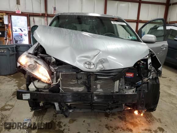 2012 Toyota Sienna LE with VIN 5TDKK3DC7CS184881, listed as a Copart auction lot 82403905 with 142,366 mi miles and Salvage title. Bid and sale history available at DreamBid. Image 5.