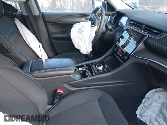 2023 Jeep Grand Cherokee Laredo with VIN 1C4RJHAG2PC540747, listed as a IAAI auction lot 41266732 with 16,859 mi miles and . Bid and sale history available at DreamBid. Image 5.