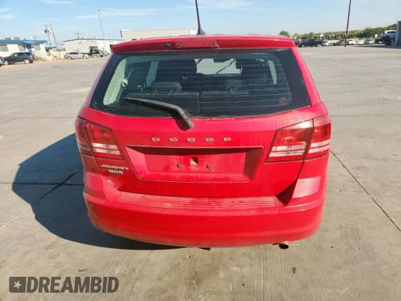 2013 Dodge Journey American Value с VIN 3C4PDCAB0DT555883, выставлен на аукционе Copart как лот 82441375 с пробегом 203 215 миль миль и Списание • Salvage title. История ставок и продаж доступна на DreamBid. Изображение 6.