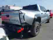 2024 Toyota Tacoma SR5 with VIN 3TMLB5JN6RM022612, listed as a IAAI auction lot 41611378 with 7,275 mi miles and . Bid and sale history available at DreamBid. Image 4.