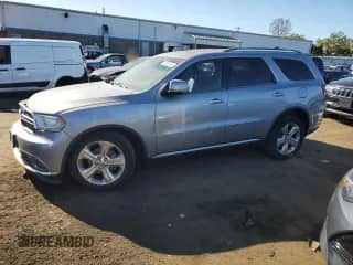 2014 Dodge Durango Limited with VIN 1C4RDJDG3EC443757, listed as a Copart auction lot 71530125 with 77,973 mi miles and Salvage title. Bid and sale history available at DreamBid. Image 1.