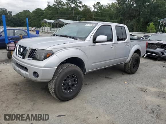 2006 Nissan Frontier SE с VIN 1N6AD07U76C422322, выставлен на аукционе Copart как лот 67911265 с пробегом 135 224 миль миль и Чистый • Clean title. История ставок и продаж доступна на DreamBid. Изображение 1.