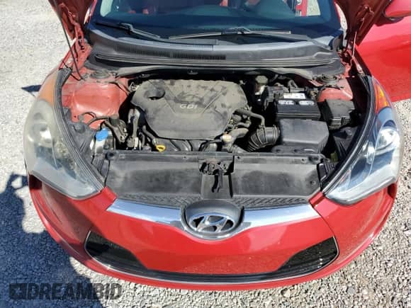 2012 Hyundai Veloster w/Gray Int с VIN KMHTC6AD1CU021344, выставлен на аукционе Copart как лот 70525255 с пробегом 134 777 миль миль и Списание • Salvage title. История ставок и продаж доступна на DreamBid. Изображение 11.