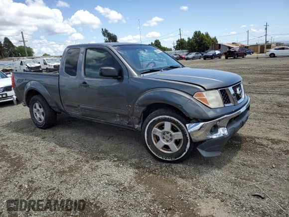 2007 Nissan Frontier SE with VIN 1N6AD06U77C418922, listed as a Copart auction lot 56603015 with 354,484 mi miles and Salvage title. Bid and sale history available at DreamBid. Image 4.