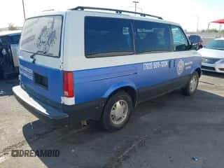 2000 Chevrolet Astro z VIN 1GNDM19W6YB157414, wystawiony jako IAAI lot #42932952 z przebiegiem 121 214 mil mil oraz . Historia ofert i sprzedaży dostępna na DreamBid. Obrazek 4.