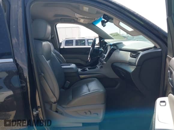 2015 Chevrolet Suburban LT z VIN 1GNSKJKC5FR543579, wystawiony jako IAAI lot #39945561 z przebiegiem 148 453 mil mil oraz . Historia ofert i sprzedaży dostępna na DreamBid. Obrazek 5.