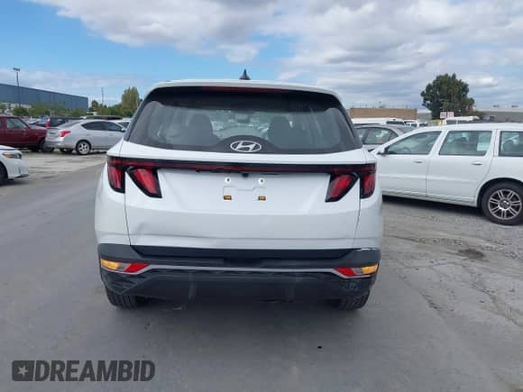2022 Hyundai Tucson SE with VIN 5NMJACAE0NH058470, listed as a IAAI auction lot 43383370 with 89,596 mi miles and . Bid and sale history available at DreamBid. Image 16.