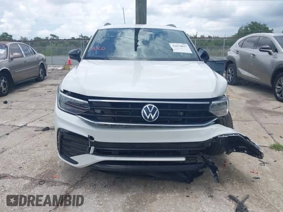 2023 Volkswagen Tiguan SE R-Line Black с VIN 3VVCB7AX0PM126184, выставлен на аукционе IAAI как лот 42676837 с пробегом 35 249 миль миль и . История ставок и продаж доступна на DreamBid. Изображение 12.