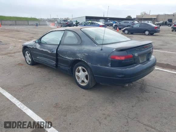 1996 Dodge Avenger with VIN 4B3AU52N6TE335141, listed as a IAAI auction lot 41909504 with 122,444 mi miles and . Bid and sale history available at DreamBid. Image 3.